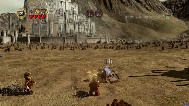 Na prawo od statuy zapisu gry znajdują się dwa mithrilowe klocki - Bitwa na polach Pelennoru | Znajdźki | LEGO The Lord of the Rings - LEGO The Lord of the Rings: Władca Pierścieni - poradnik do gry