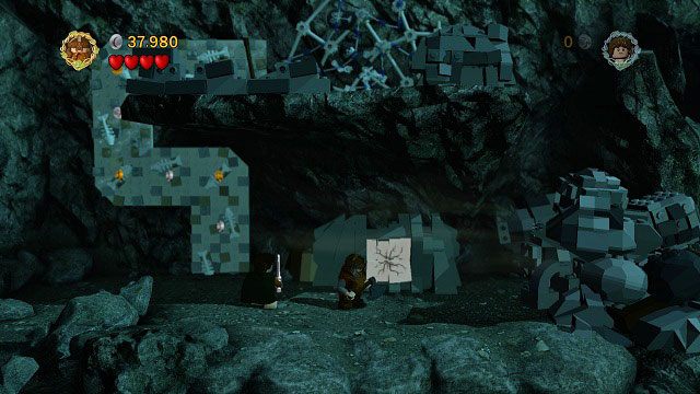 Na prawo od drugiej ściany do wspinaczki znajduje się pęknięty klocek LEGO - Tajne Schody | Znajdźki | LEGO The Lord of the Rings - LEGO The Lord of the Rings: Władca Pierścieni - poradnik do gry