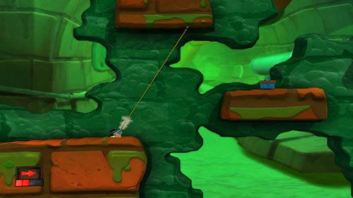 Zaczepiwszy się półki skalnej [ilustracja] rozbujajmy naszego robala tak, by znalazł się nad kolejną skrzynką - Kanał ściekowy | Łamigłówki | Worms Revolution - Worms: Revolution - poradnik do gry