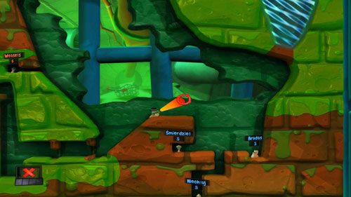 Nadszedł czas, by ostatecznie rozprawić się z wrogiem - celując w zbiornik wodny oddajemy silny strzał [ilustracja], dzięki czemu wroga drużyna znajdzie się pod wodą - Kanał ściekowy | Łamigłówki | Worms Revolution - Worms: Revolution - poradnik do gry