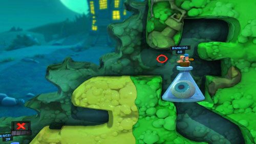 Następnie teleportujemy się w na półkę skalną obok naczynia [ilustracja], po czym używając Mobilizatora, spychamy na nie naszego ostatniego przeciwnika - Strach | Łamigłówki | Worms Revolution - Worms: Revolution - poradnik do gry