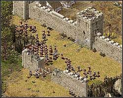 Po jej rozwaleniu na następny teren wbiegnij całym wojskiem (tylko odsuń ich od muru, bo uderzając go niecelnymi kulami z katapult ginąć będą również żołnierze) - Misja XIII - Oczy Węża | Kampania i misje dodatkowe w Twierdza - Twierdza - poradnik do gry