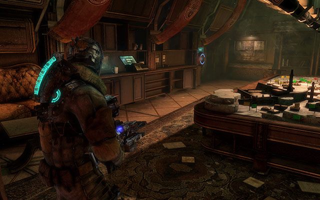 Na szafce po lewej stronie, w pomieszczeniu z makietą na środku - Rozdział 10 | Sekrety | Dead Space 3 - Dead Space 3 - poradnik do gry