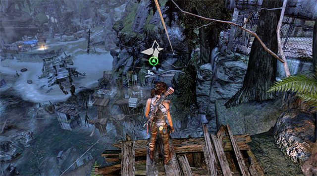Ustaw się na niewielkiej rampie pokazanej na dołączonym screenie i złap się liny - Powróć do obozu rozbitków na plaży | 22 - Zaginiony | Solucja Tomb Raider - Tomb Raider - poradnik do gry