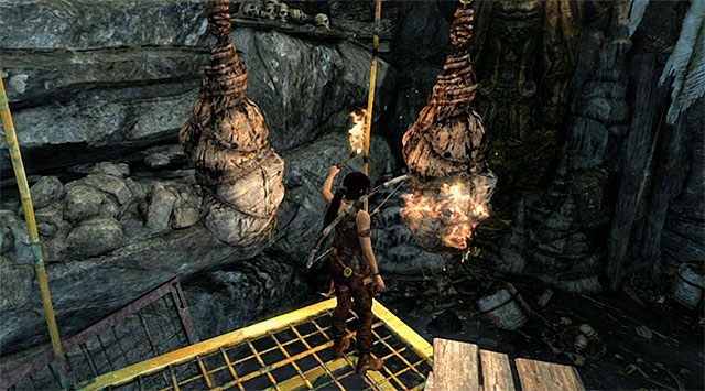 Z zapaloną pochodnią powróć na platformę z trzema kokonami - Grobowiec Niegodnych | Opcjonalne grobowce - Mountain Village | Tomb Raider - Tomb Raider - poradnik do gry