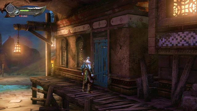Biegnąc dalej trzymaj się prawej strony, wejdź na drewniany ganek i rozwal drzwi do budynku po prawej - Początek wioski (2) - God of War: Ascension - poradnik do gry