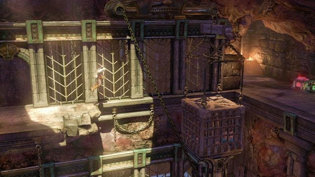 Możesz teraz bezpiecznie przeskoczyć na metalową klatkę i dostać się do zielonej i czerwonej skrzyni - 17 - Komnata Męczennika | Opis przejścia | God of War Wstąpienie - God of War: Ascension - poradnik do gry