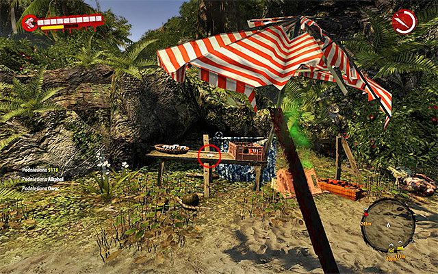 Zbadaj niewielki stolik przy dużym parasolu, zabierając leżący na nim przewodnik - Przewodniki - Dżungla - Sekrety - Dead Island Riptide - poradnik do gry