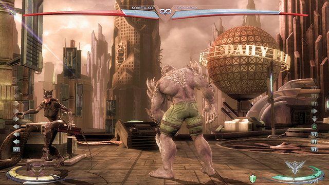 Na lewym krańcu areny znajduje się metalowe urządzenie - Injustice: Metropolis - arena - Injustice Gods Among Us - poradnik do gry