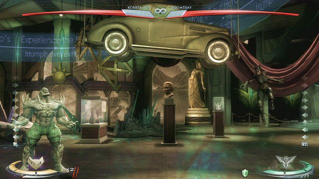 Po prawej stronie areny znajduje się samochód zawieszony pod sufitem, aby z niego skorzystać należy podskoczyć - Injustice: Metropolis - arena - Injustice Gods Among Us - poradnik do gry