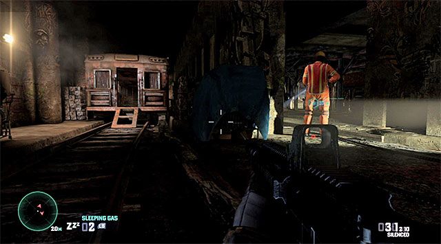 Po minięciu pierwszego wagonu skręć w stronę lewej części tunelu, omijając od lewej strony drugi wagon - Rozbrojenie drugiej bomby | Misja 7 - Transport | Splinter Cell Blacklist - Tom Clancys Splinter Cell: Blacklist - poradnik do gry