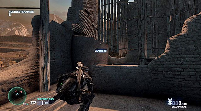 Paczka leży na ziemi przy pracującym młynie - Misje Kobina | Paczki (Dead Drops) | Splinter Cell Blacklist - Tom Clancys Splinter Cell: Blacklist - poradnik do gry