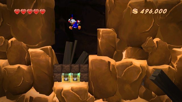 W większości przypadków tajemne skarby są bardzo łatwe do odnalezienia. - Dolne poziomy kopalni | Afrykańskie kopalnie | DuckTales - DuckTales Remastered - poradnik do gry