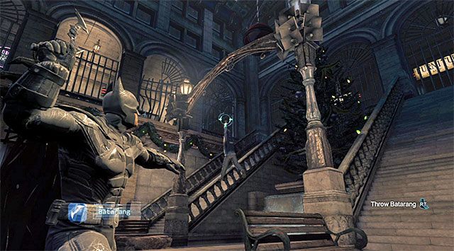 Użyj batarangu żeby uwolnić policjanta - Shiva | Poszukiwani przestępcy w Batman Arkham Origins - Batman: Arkham Origins - poradnik do gry