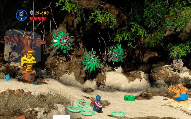 Po rozpoczęciu misji podejdź Kapitanem Ameryką do krzaczka po lewej i wyruguj go, otrzymując za to kilka klocków - Rapturous Rise | Opis przejścia LEGO Marvel Super Heroes - LEGO Marvel Super Heroes - poradnik do gry