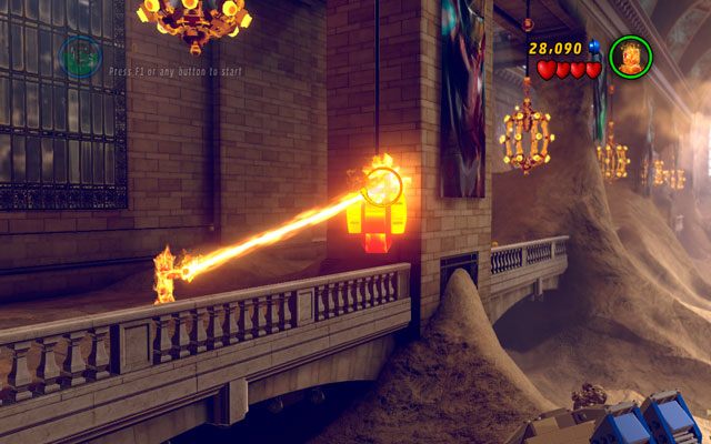 Po wejściu na teren metra wybierz Ludzką Pochodnię i podleć do urządzenia po lewej stronie - Sand Central Station | Zestawy MiniKit w LEGO Marvel Super Heroes - LEGO Marvel Super Heroes - poradnik do gry