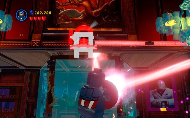 Obróć się w taki sposób, aby promień trafił w czerwony generator nad akwarium, w którym siedzi Kingpin - Feeling Fisky | Bonusowe misje Deadpoola | LEGO Marvel Super Heroes - LEGO Marvel Super Heroes - poradnik do gry