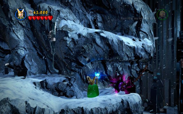 Jako Loki obróć kołowrót, który znajduje się na końcu skarpy, a następnie zeskocz w dół - czeka Cię walka z Malekithem - Bro-tunheim | Bonusowe misje Deadpoola | LEGO Marvel Super Heroes - LEGO Marvel Super Heroes - poradnik do gry