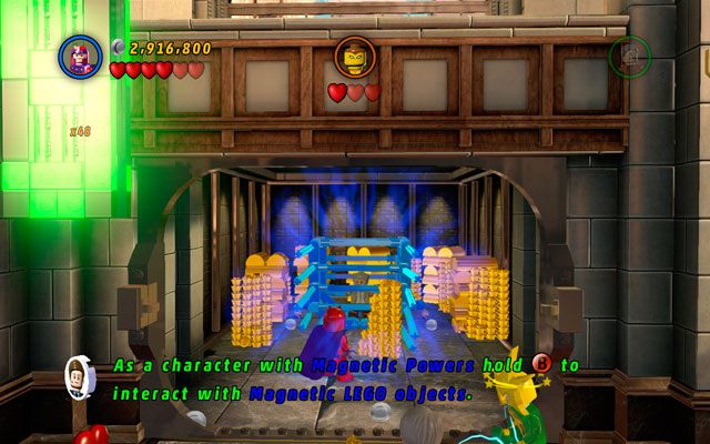 W ostatniej fazie misji, po wywabieniu Shockera z sejfu, wejdź do środka i zamień się w Magneto - A Shock Withdrawal | Znajdźki na bonusowych poziomach | LEGO Marvel Super Heroes - LEGO Marvel Super Heroes - poradnik do gry