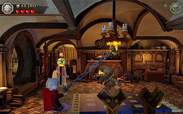 Zrzuć żyrandol z pomocą cepa i użyj następnie łopaty - Etap 2 (An Unexpected Party) | Główne etapy - Sekrety w LEGO The Hobbit - LEGO The Hobbit - poradnik do gry