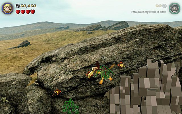 Musisz doskakiwać elfem do kolejnych wbitych do ściany strzał - Etap 5 (The Troll Hoard) | Główne etapy - Sekrety - LEGO The Hobbit - poradnik do gry