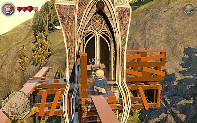 Zabierz pokrętło ze skrzyni i dotrzyj z nim do pobliskiego mechanizmu - Odnajdywanie mithrilowych klocków (16-30) | Śródziemie - Mithrilowe klocki LEGO - LEGO The Hobbit - poradnik do gry