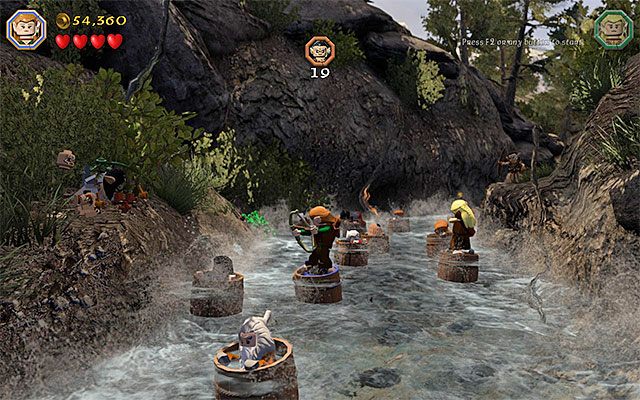 Używaj łuku żeby pozbywać się goblinów stojących po obu stronach rzeki - Etap 11 (Barrels Out of Bond) - Spływ rzeką | Opis przejścia LEGO The Hobbit - LEGO The Hobbit - poradnik do gry