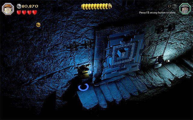 Uchwyty znajdują się na lewo i na prawo od bramy - Etap 13 (Looking for Proof) - Grobowiec czarnoksiężnika z Angmaru | Opis przejścia - LEGO The Hobbit - poradnik do gry