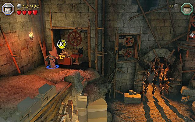 Miejsce włożenia pokrętła do slotu - Etap 14 (The Necromancer) - Wnętrze twierdzy | Opis przejścia LEGO The Hobbit - LEGO The Hobbit - poradnik do gry