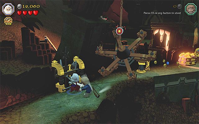 Zniszczenie stojaka na bronie pozwoli ci zabrać łuk - Etap 16 (Inside Information) - Skarbiec | Opis przejścia LEGO The Hobbit - LEGO The Hobbit - poradnik do gry