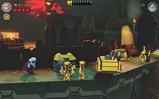 Przemieszczaj się tylko jeśli Smaug nie obserwuje aktualnie obszaru przed głównymi bohaterami - Etap 16 (Inside Information) - Skarbiec | Opis przejścia LEGO The Hobbit - LEGO The Hobbit - poradnik do gry
