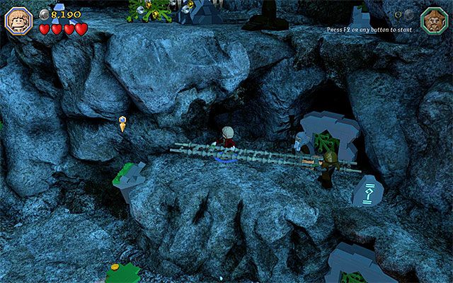 Podnieś drabinę dwiema postaciami i przejdź z nią w lewo - Etap 3 (Azog the Defiler) - Obozowisko | Opis przejścia LEGO The Hobbit - LEGO The Hobbit - poradnik do gry