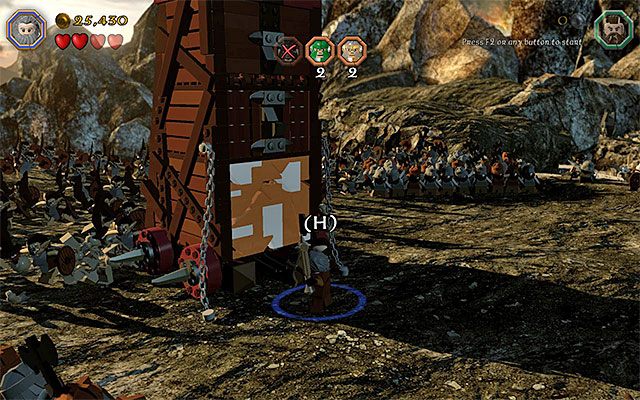 Użyj akcji zespołowej do zniszczenia jednej ze ścian wieży oblężniczej - Etap 3 (Azog the Defiler) - Bitwa z orkami | Opis przejścia LEGO The Hobbit - LEGO The Hobbit - poradnik do gry