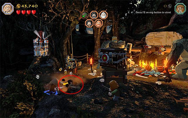 Po udanej akcji podnieś leżący na ziemi cep (Flail) i od razu wybierz go z inwentarza - Etap 4 (Roast Mutton) - Uratowanie sojuszników | Opis przejścia LEGO The Hobbit - LEGO The Hobbit - poradnik do gry