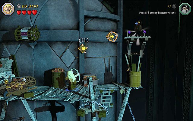 Skorzystaj z łuku i następnie z opcji dalekich skoków - Etap 16 (Inside Information) | Główne etapy - Sekrety w LEGO The Hobbit - LEGO The Hobbit - poradnik do gry