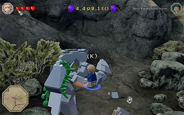 Do ostatniej kozy prowadzi schowany za skałami właz - Białe pytajniki - opisy przejścia zadań (1-20) | Śródziemie - Zadania poboczne - LEGO The Hobbit - poradnik do gry