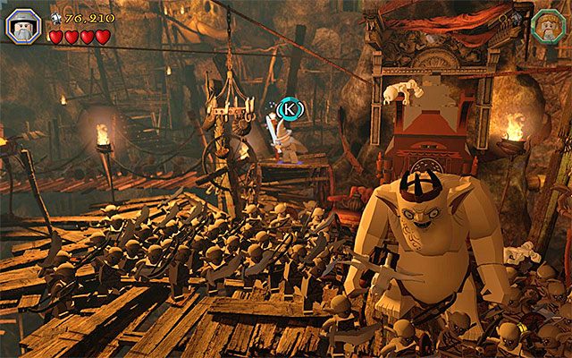 Przytrzymaj klawisz specjalnego ataku Gandalfa - Etap 7 (Goblin-town) - Pierwszy pojedynek z Wielkim Goblinem | Opis przejścia - LEGO The Hobbit - poradnik do gry