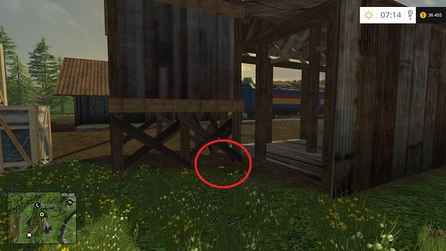 W okolicy miejsca, gdzie stoi pociąg, pod drewnianą konstrukcją - Sektor A: monety 1 - 12 | Złote monety w Farming Simulator 15 - Farming Simulator 15 - poradnik do gry