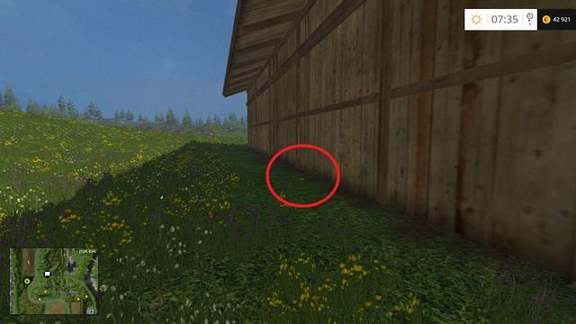 Za stojącym tuż przy drodze drewnianym budynkiem - Sektor A: monety 1 - 12 | Złote monety w Farming Simulator 15 - Farming Simulator 15 - poradnik do gry