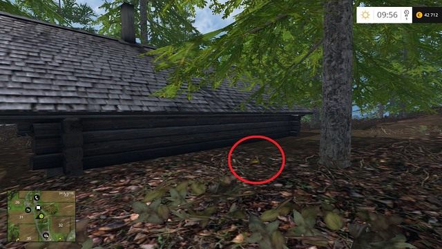 Z boku drewnianej chaty, obok drzewa - Sektor E: monety 55 - 69 | Złote monety w Farming Simulator 15 - Farming Simulator 15 - poradnik do gry