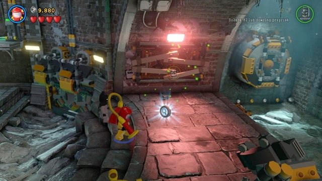 Po zebraniu wszystkich 25 klocków, podejdź do maszyny i naciśnij klawisz interakcji - Pościek | Opis przejścia Lego Batman 3 Poza Gotham - LEGO Batman 3: Poza Gotham - poradnik do gry