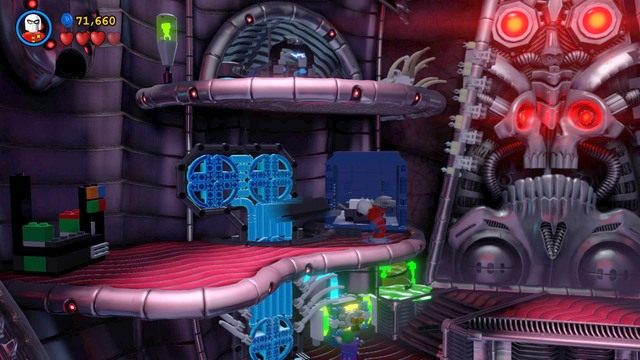 Będąc na wyższym poziomie podejdź do szafki po prawej stronie i zakotwicz hak - Czaszkoła Przetrwania | Opis przejścia Lego Batman 3 Poza Gotham - LEGO Batman 3: Poza Gotham - poradnik do gry