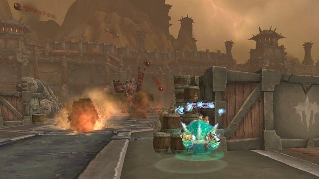 Pomiędzy kontenerami powinniśmy przeskakiwać w przerwach ataków Skulloca. - Iron Docks | Instancje (Dungeons) w World of Warcraft Warlords of Draenor - World of Warcraft: Warlords of Draenor - poradnik do gry