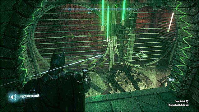 W pomieszczeniu ze znajdźką przebywa robot Człowieka-Zagadki - Trofea Człowieka-Zagadki na wyspie Miagani Island (1-19) | Wyspa Miagani Island - Batman Arkham Knight - poradnik do gry