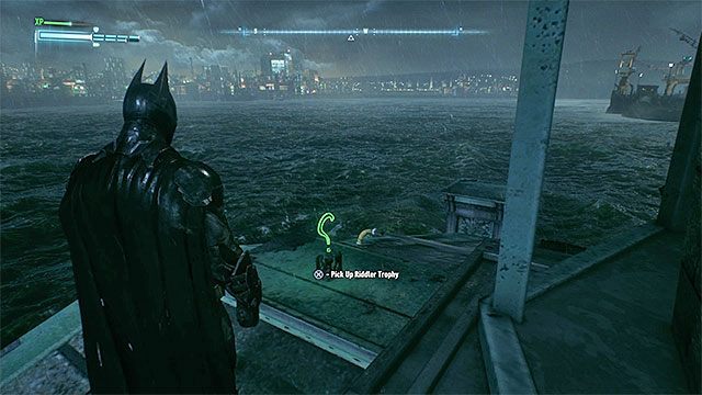 Dotrzyj do końcowej części molo - Trofea Człowieka-Zagadki na wyspie Miagani Island (20-38) | Wyspa Miagani Island - Batman Arkham Knight - poradnik do gry