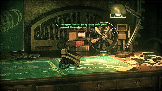 Zeskanuj hełm leżący na stole - Zagadki słowne na wyspie Miagani Island | Wyspa Miagani Island - Batman Arkham Knight - poradnik do gry
