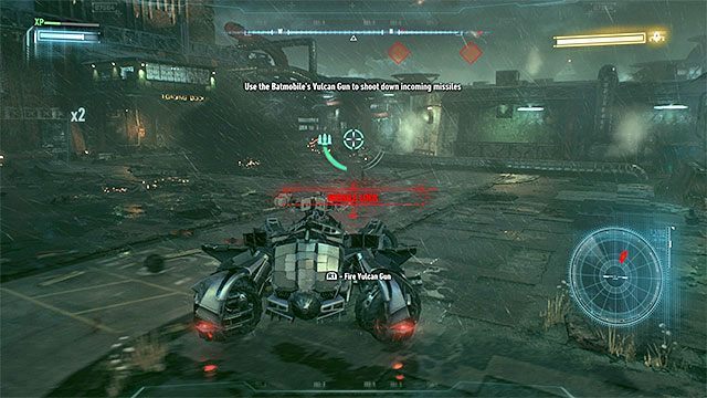 Używaj działka Vulcan żeby niszczyć rakiety lecące w stronę pojazdu Batmana - Rycerz Arkham (Arkham Knight) - pierwsze starcie | Pojedynki z bossami - Batman Arkham Knight - poradnik do gry