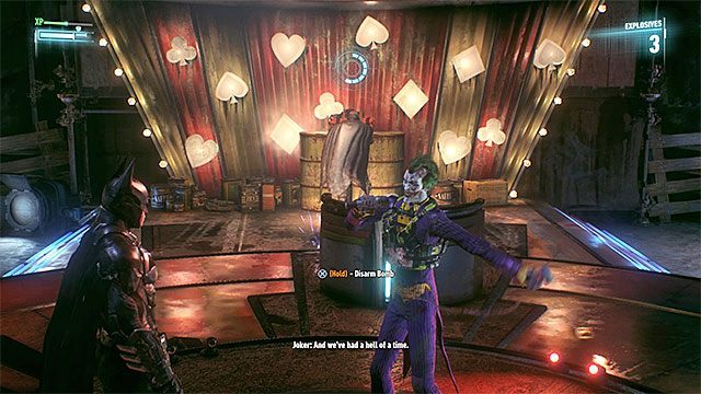 Rozbrajaj bomby gdy Johnny Charisma jest zwrócony w inną stronę - Johnny Charisma | Pojedynki z bossami w Batman Arkham Knight - Batman Arkham Knight - poradnik do gry