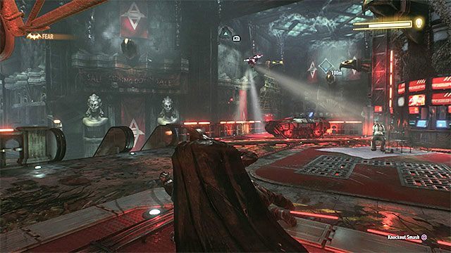 Latającego drona możesz tymczasowo oślepiać, ale przez większość czasu lepiej go unikać - Rycerz Arkham (Arkham Knight) - czwarte starcie (bezpośrednia konfrontacja) | Pojedynki z bossami - Batman Arkham Knight - poradnik do gry