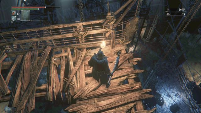 Lina, po której przecięciu podpalisz kilku przeciwników znajdujących się na dole. - Stare Yharnam | Opis przejścia Bloodborne - Bloodborne - poradnik do gry